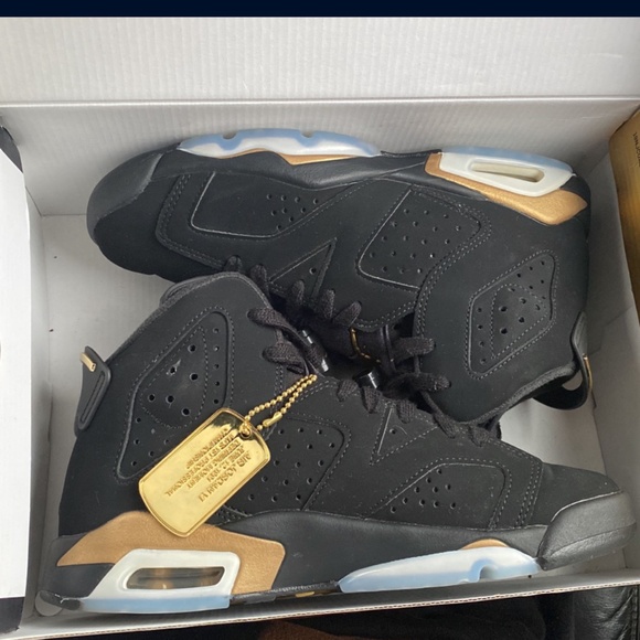 Jordan 6 retro dmp black & gold